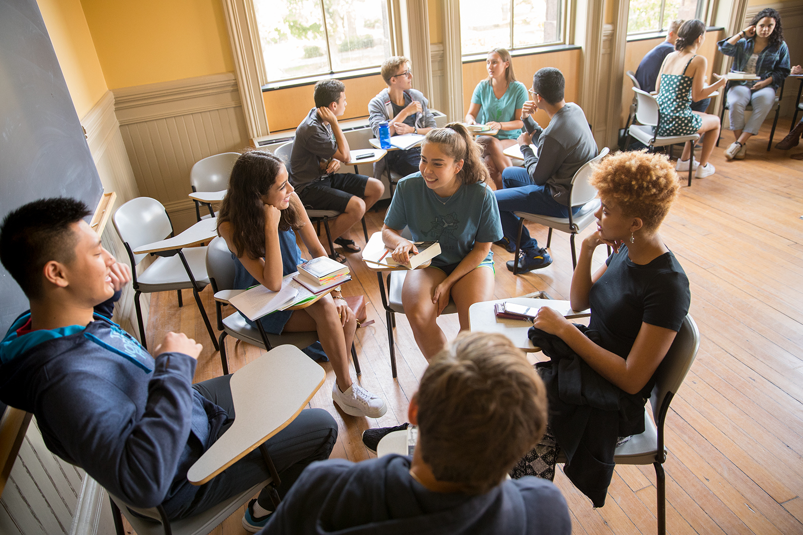 Students at First Readings, actively engaged in dialogue