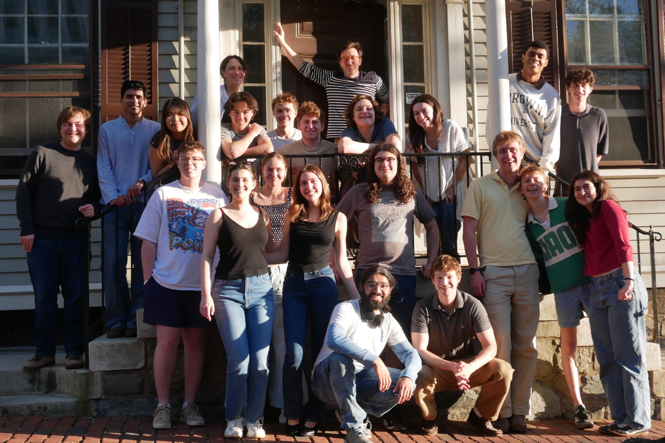 Group of students posing outside building